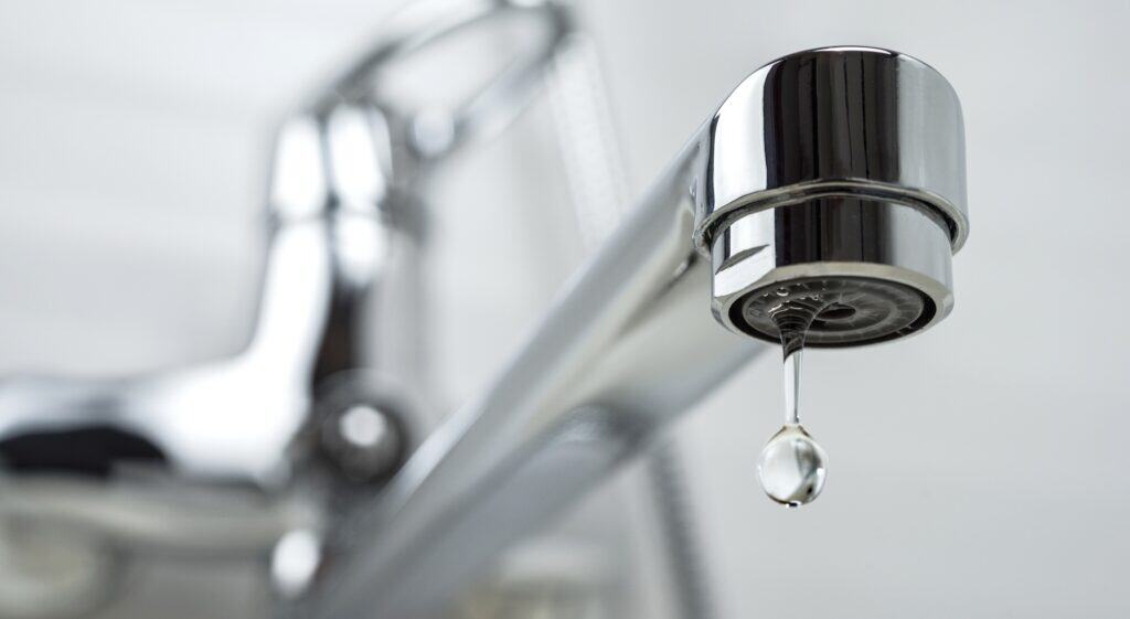 Water leaking from a faucet