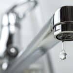 Water leaking from a faucet