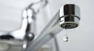 Water leaking from a faucet