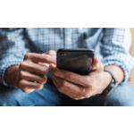 Man holding a cell phone.