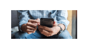 Man holding a cell phone.