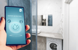 Water leak detection system notification on phone says water detected.