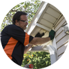 Man checking soffit openings